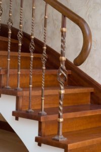 traditional-wrought-iron-balustrade-with-wooden-handrail